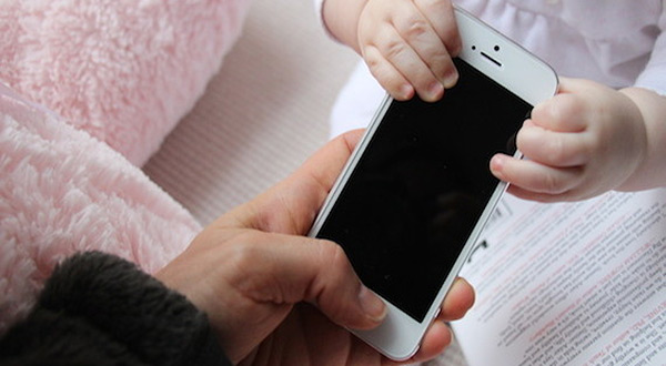 iPhone with mother and child